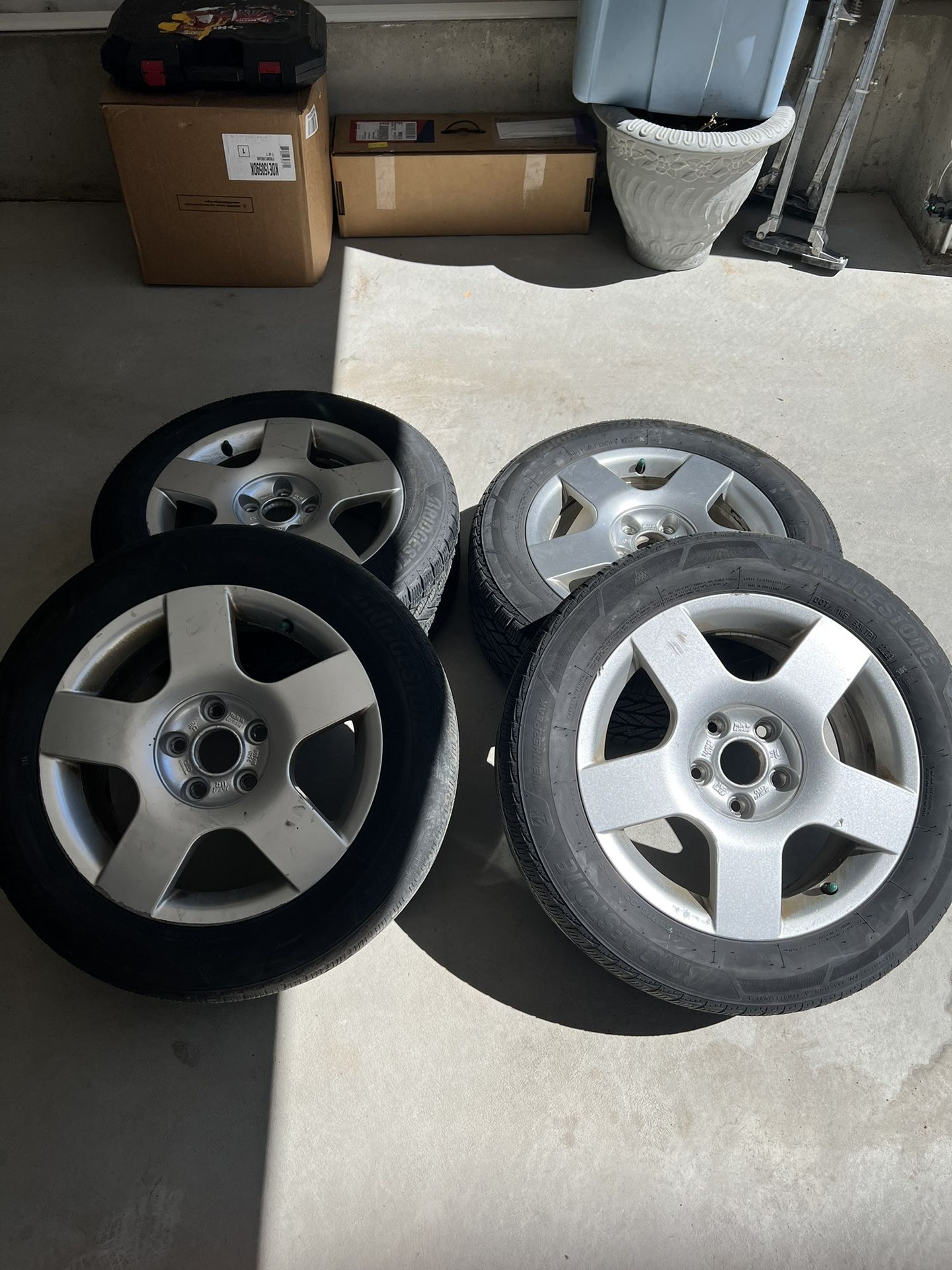 Stock 2003 Audi A4 rims with Bridgestone Weather Tires