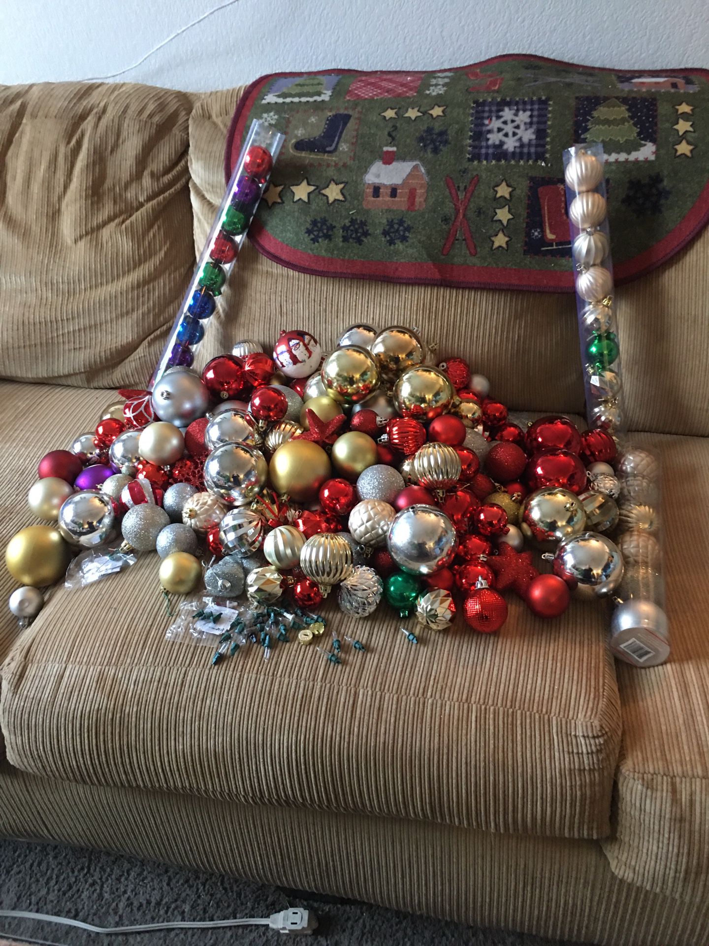 175 Christmas balls and a Christmas mat for outside $25for All