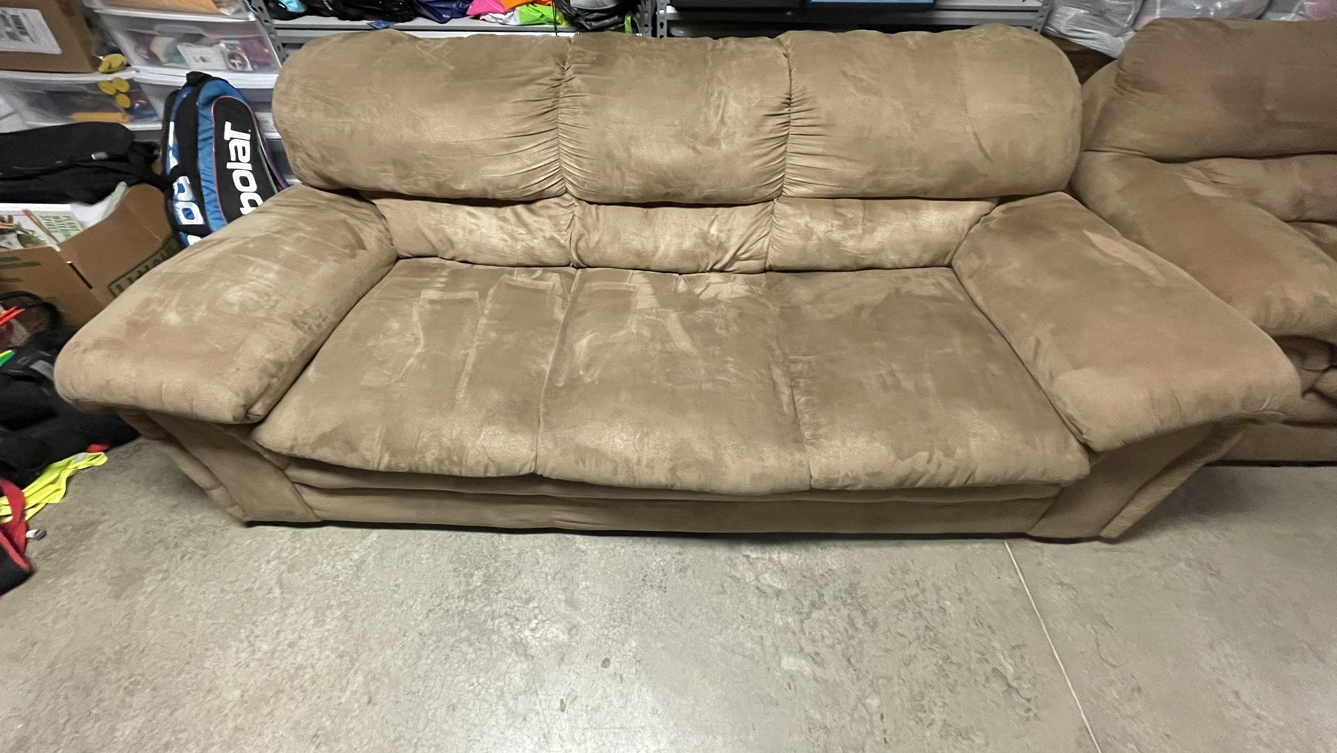 Beige Couch, Chair, and Ottoman 