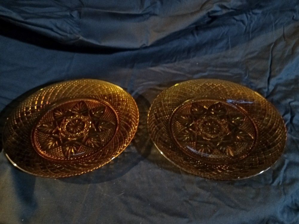 A Set Of Two Medium Amber Antique Plates