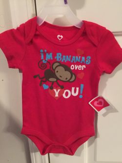 Brand New with tags Valentines Onesie. Size 12 months