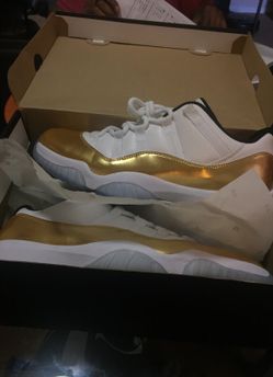 Low gold Jordan 11s