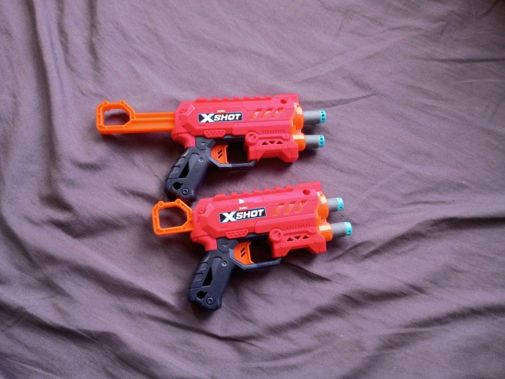Two Dart Guns With Darts