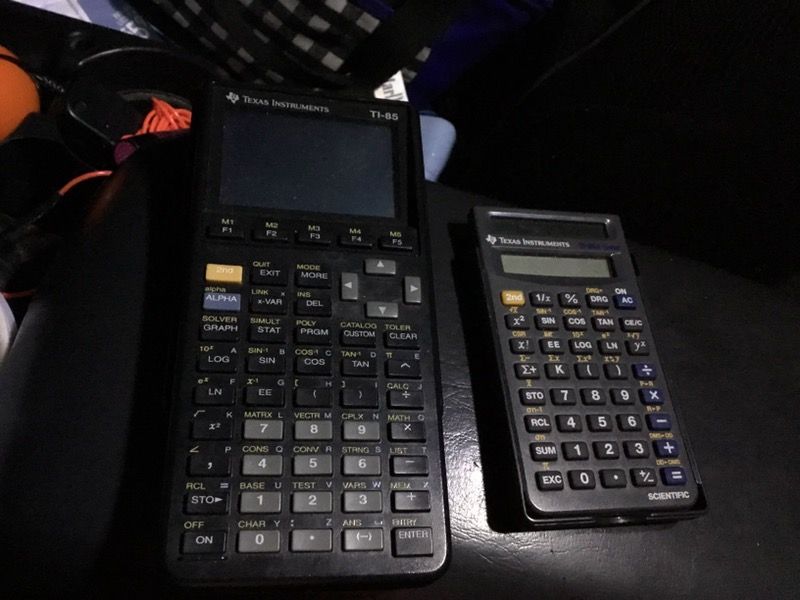Texas instrument T185 and smaller one is scientific calculator