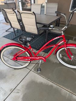 Red Beach Cruiser Bicycle with Floral Design