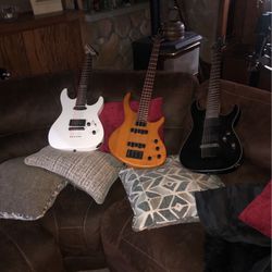 2 Lectric Guitars And A Bass