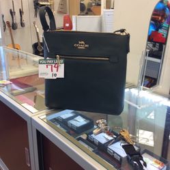 Coach. Crossbody