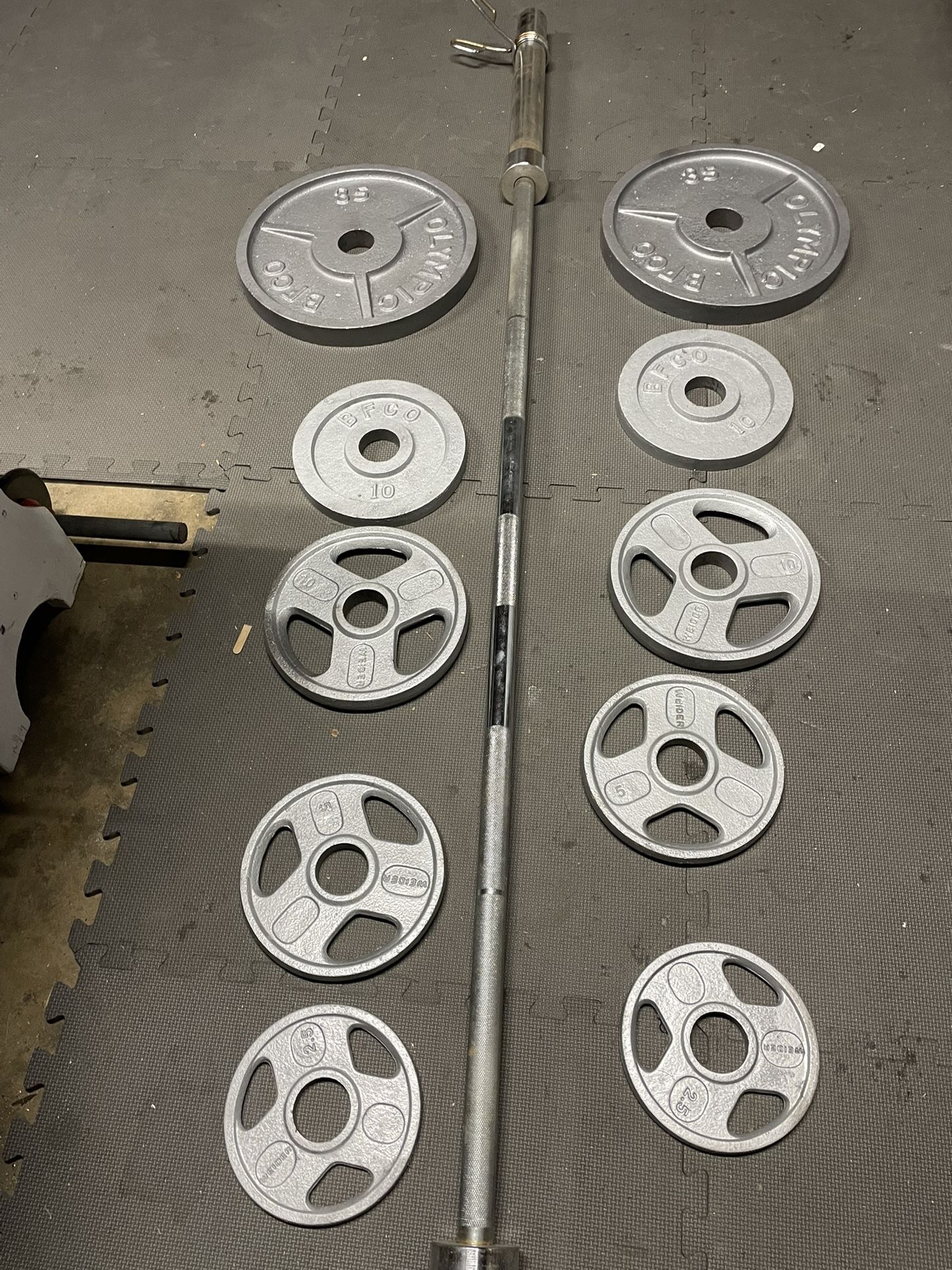 Olympic Weight Plates / Bar. 160 Dollars