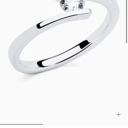 RABAT (Barcelona) White gold engagament ring with central diamond.