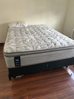 Queen Matress (box spring and frame included)