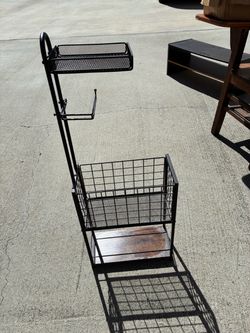Toilet paper holder with cell phone rack