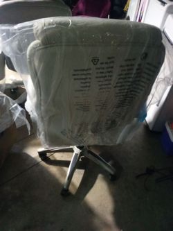 Office Chair with Wheels Still in Plastic