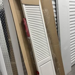 Kimberly Bay Traditional Louver-Panel 28 In. X 80 In. Solid Core White Primed Wood Bi-Fold Door With Hardware