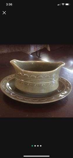 Beautiful stoneware, gravy boat and matching saucer, sage green in color