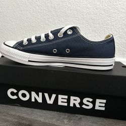 Brand new Converse sneakers in Oxford Navy Blue, never worn and in the original box.