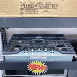 Whirlpool  Gas Cooktop in Stainless steel with AccuSimmer® Burner and EZ-2-Lift™ Hinged Grates