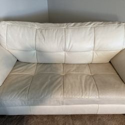 Ashleys Leather White Couches