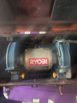 Ryobi” bench grinder