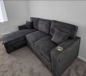 2-pc Sectional Sofa With pull-out bed & Storage Chaise new in box