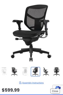 Comfortable office chair has breathable tan mesh back and padded black fabric seat. It includes adjustable height lever and rolling swivel base with f