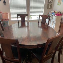 Hardwood table And Chairs. 