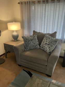 Oversized chair also known as a chair and 1/2