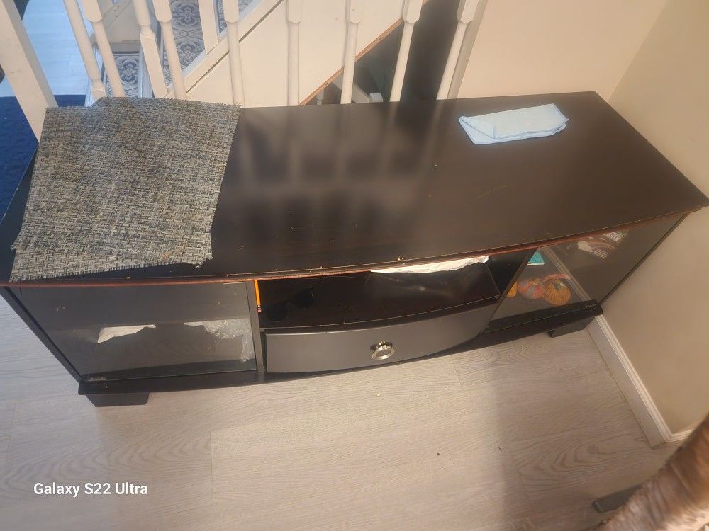 Tv Stand With 2 Glass Door And A Drawer