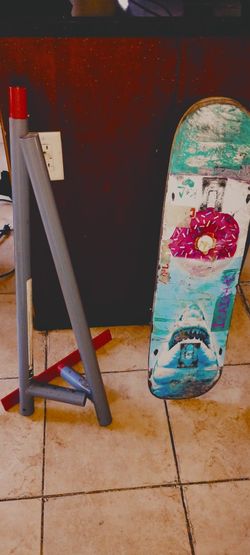 Skate deck and tony hawk skate rail 