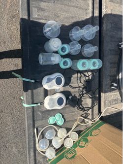 Motif wearable breast pumps