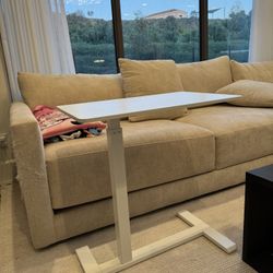 Mobile adjustable desk with hidden wheels