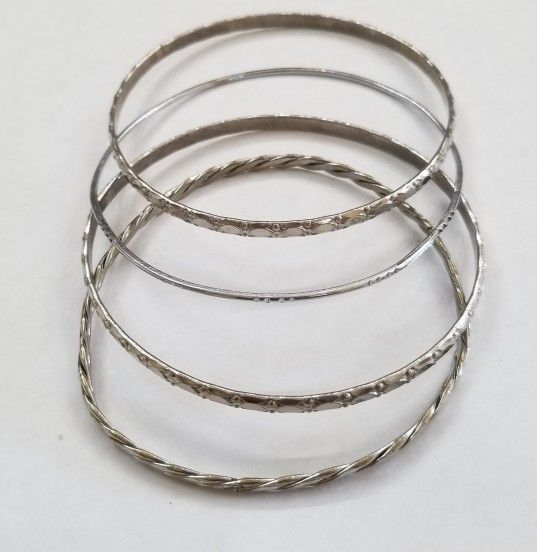 Four Silver Plated Bangle Bracelets