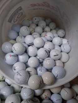 Approximately 290 white golf balls