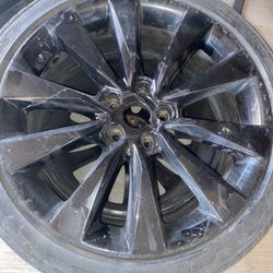 19 inch black rims with 2 tires