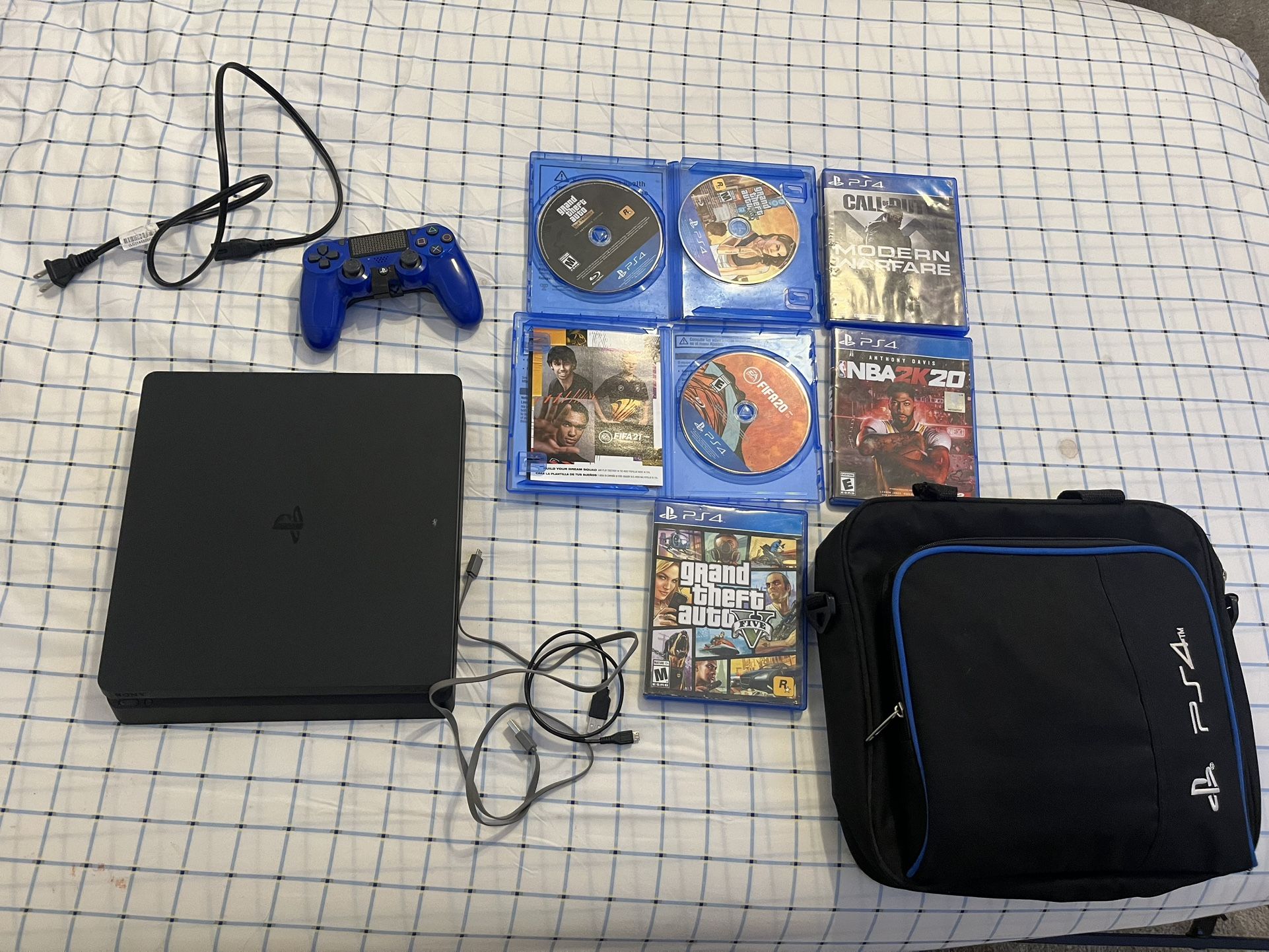 PS4 Slim With Games And Attachments
