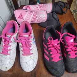 Girls soccer cleats and shin guards