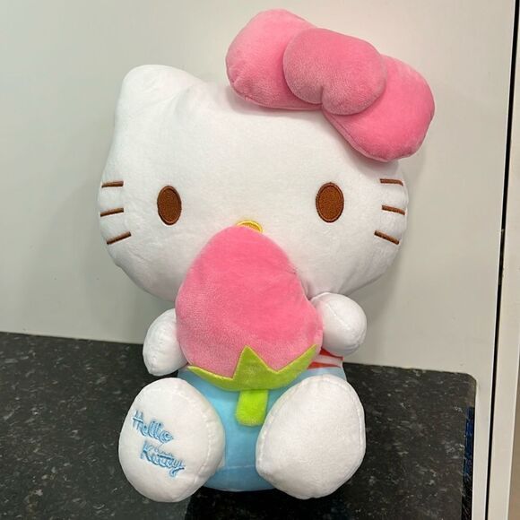 Sanrio Hello Kitty Holding strawberry with pink bow on head 14” 