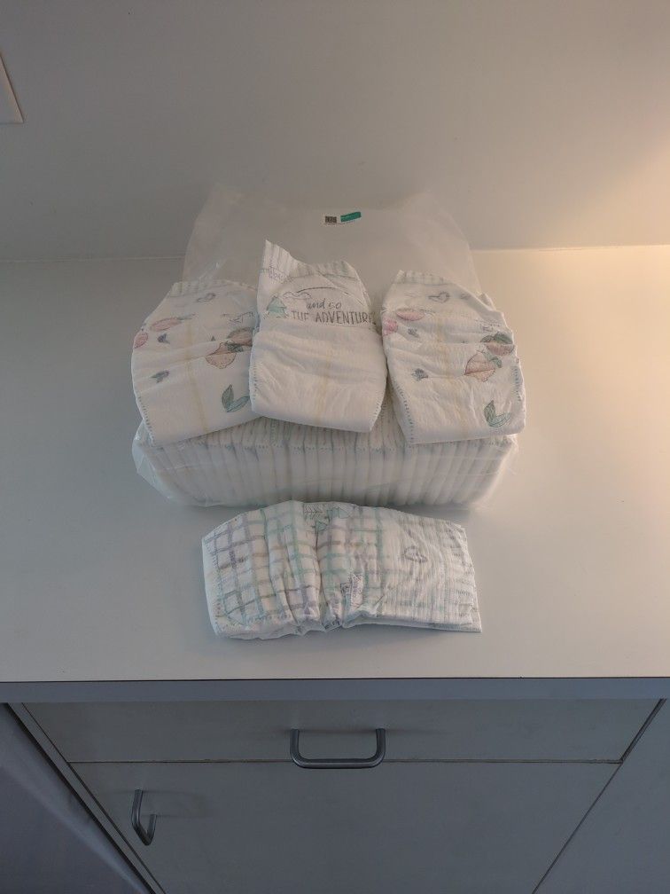Five Size Five Pampers Disposable Diapers