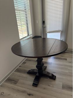 Dark wood dining table
