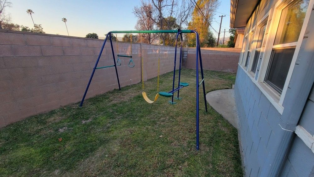 Backyard Metal Swing Set With Swing, Glider And Rings.