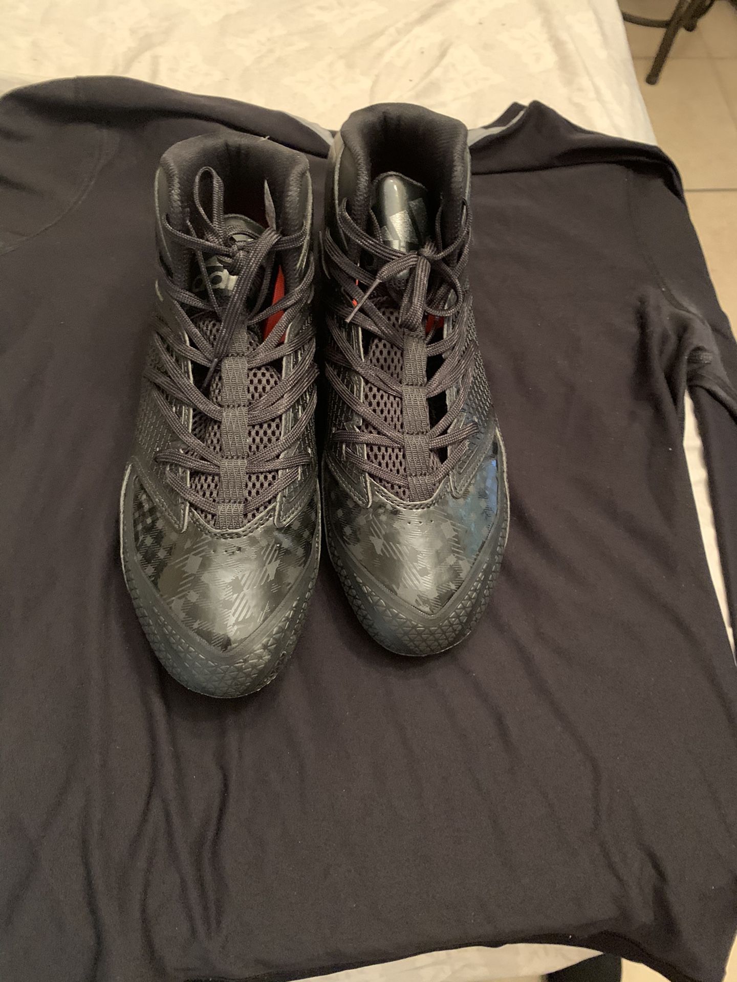 Adidas football or baseball cleats