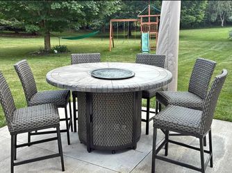 High top patio fire table and 6 chairs