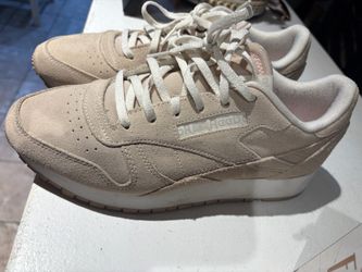 Women’s Reebok cream sneakers