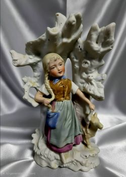 Antique German bisque porcelain figurine spill manufactured by Unger, Schneider