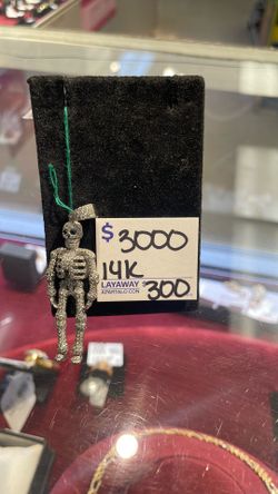 Diamond skull pendant