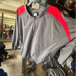 Nike Storm Fit Men’s Windbreaker Size XL Pull over color grey/red