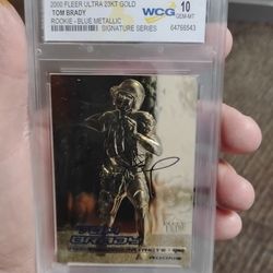 Tom Brady Gold Fleer rookie card 23 k Football card graded 10