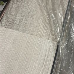 FREE 8 Pieces Of Grey Vinyl Flooring