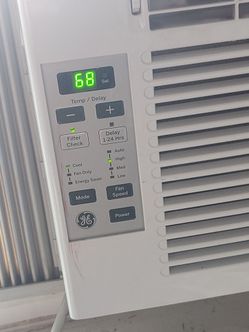 G e window air conditioner new very few hours small but powerful 50/50 on a BTUs per hour