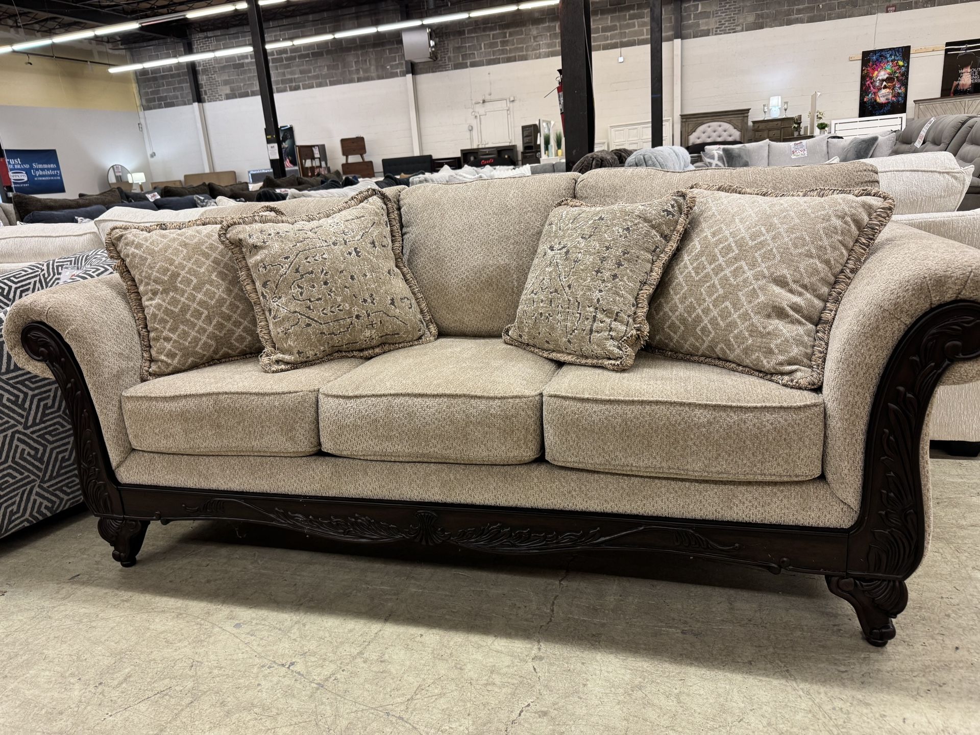 Emma wheat Sofa With Elegant hand carved wood trim!