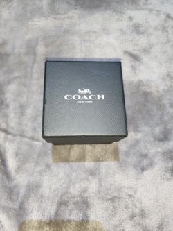 Coach luxury timepiece presentation box.